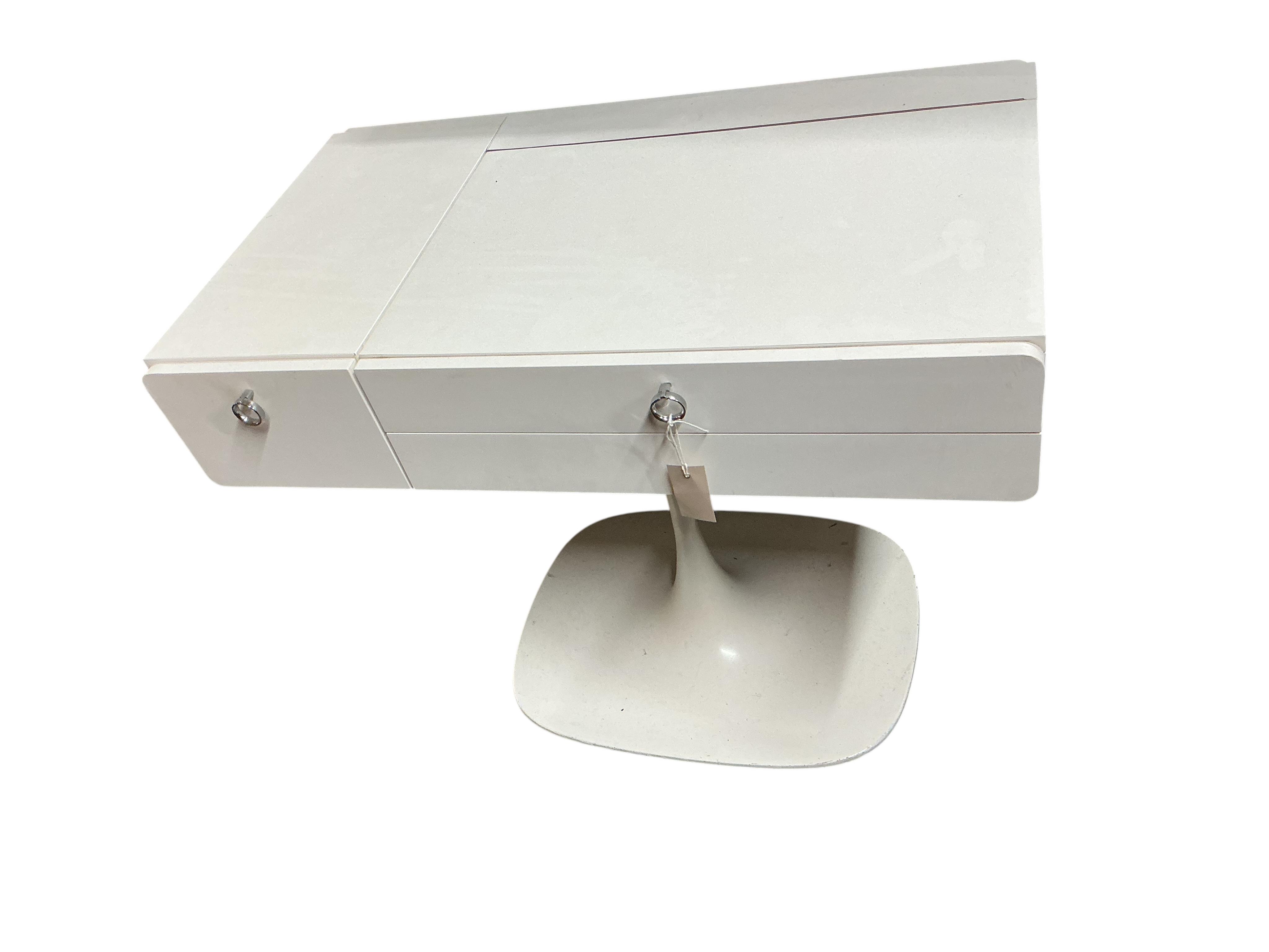 A 1960’s white tulip base dressing table, width 84cm, depth 48cm, height 66cm